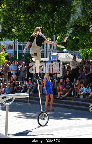 Unicycle street entertainer, Cathedral Square, Christchurch, Canterbury, South Island, New Zealand Stock Photo