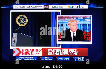 US President Barack Obama holding a live press conference on television Stock Photo