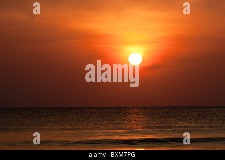 Golden Sunrise over the Indian Ocean at Nilaveli near Trincomalee on Sri Lanka's East Coast. Stock Photo