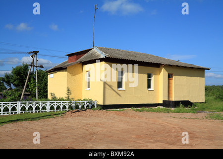 yellow building on railway Stock Photo