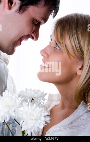 Young loving couple looking to each other Stock Photo