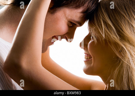 Young loving couple looking to each other Stock Photo