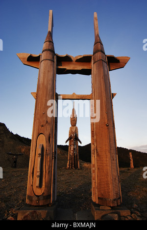 Maori wood carvings on top of Mt Hikurangi,East Cape,New Zealand Stock Photo