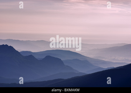 sunrise over misty hills, view from mt hikurangi,east cape,new zealand Stock Photo