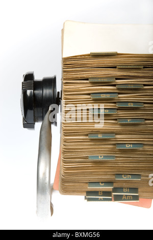 Close-up of vintage rotary card file holder on white background Stock Photo