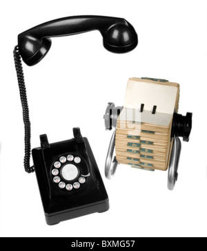 Set of vintage retro rotary telephone and rotary card file on white background Stock Photo