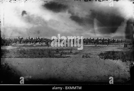 Morris Island, South Carolina. Unidentified artillery unit  horses and soldiers gathered in an open area Stock Photo