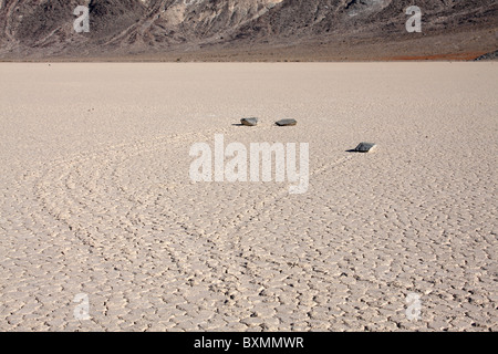 Trails created by moving rocks on the Racetrack Playa in Death Valley National Park. Stock Photo