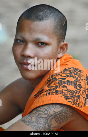 Tattoed Cambodian Buddhist monk, Siem Reap Stock Photo