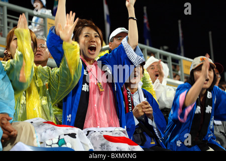 Japanese fans/supporters celebrating, Argentina 2 Japan 1, Ladies Field Hockey Finals Beijing Olympics China Stock Photo