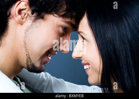 Young loving couple looking to each other Stock Photo