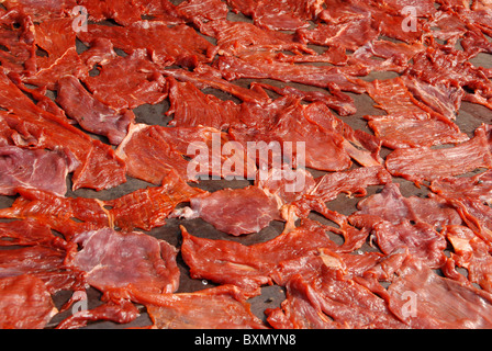 moo dad deow ( pork one day in the sun ) fresh pork laid out to dry in sun , thai dried pork for bbq , delicacy , thailand Stock Photo