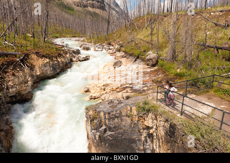 Two tourists at Marble Canyon, Kootenay National Park, Rocky Mountains, British Columbia, Canada Stock Photo