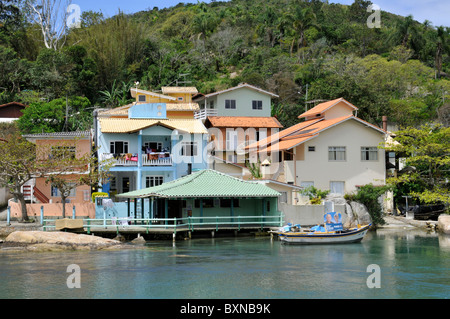 Boats and houses on canal, Fishing village, Barra da Lagoa, Florianopolis, Santa Catarina, Brazil, South Atlantic Stock Photo