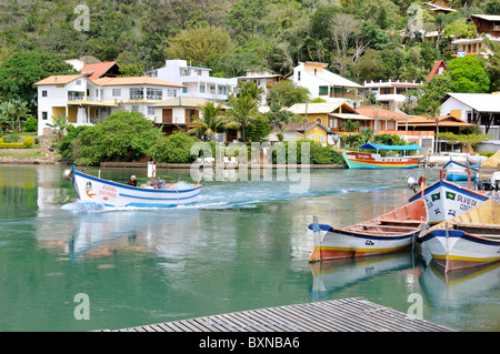 Boats and houses on canal, Fishing village, Barra da Lagoa, Florianopolis, Santa Catarina, Brazil, South Atlantic Stock Photo