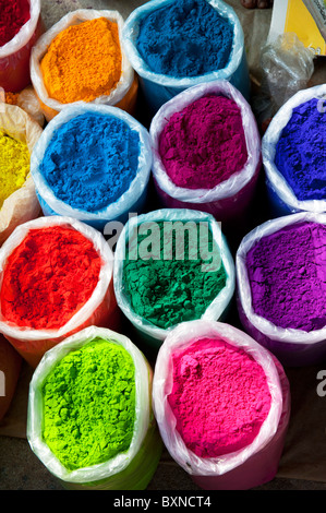 Bags of coloured powder at an Indian street market. Andhra Pradesh, India Stock Photo