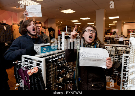 UK Uncut protesters demonstrating at a branch of Dorothy Perkins clothes shop protesting about tax avoidance by Arcadia Group UK Stock Photo