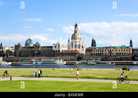 GERMANY Saxony Dresden City skyline on River Elbe in front of embankment buildings on Bruhl Terrace busy with tourists Stock Photo