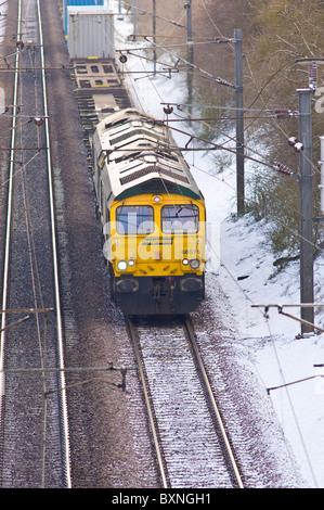 Freightliner diesel train going north on the east coast mainline near Retford, Nottinghamshire, England Stock Photo