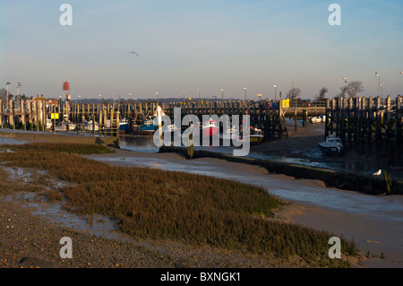 Fishing Boats At Low Tide On The River Rother Rye Harbour East Sussex England Stock Photo