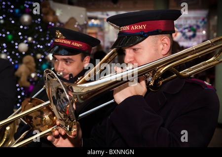 UK, England, Yorkshire, Leeds, Merrion Centre, Salvation Army Band playing carols at Christmas Stock Photo