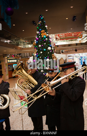 UK, England, Yorkshire, Leeds, Merrion Centre, Salvation Army Band playing carols at Christmas Stock Photo