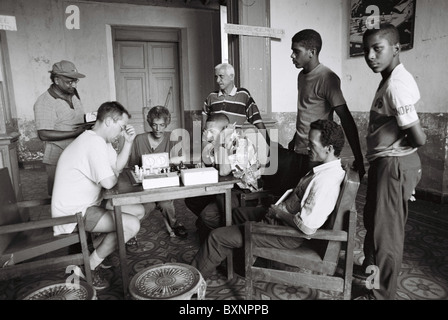 Men playing chess in chess club in Santiago De Cuba. Stock Photo
