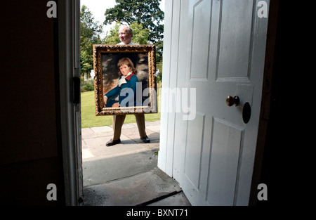 Tom Carpenter, Trustee of Jane Austen's House in Chawton, Hampshire, carries a newly acquired painting of Jane Austen's brother Stock Photo