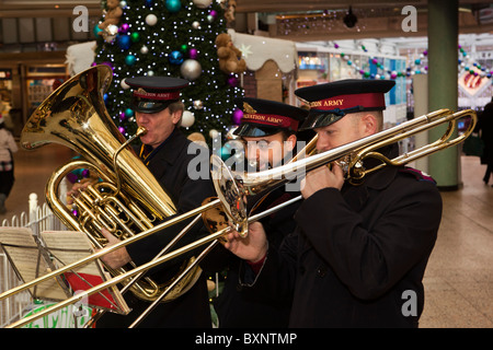 UK, England, Yorkshire, Leeds, Merrion Centre, Salvation Army Band playing carols at Christmas Stock Photo