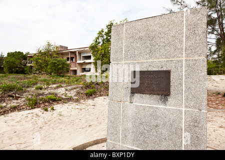 A plaque commemorating the establishment of the hotel on Santa Carolina Island in Mozambique now deserted after the civil war. Stock Photo