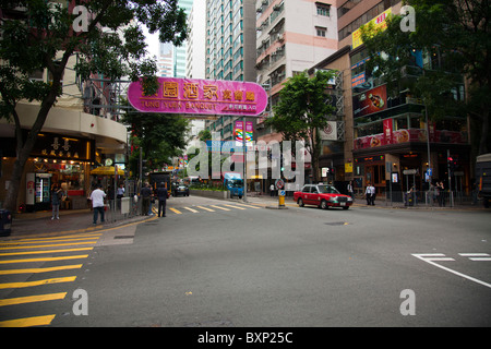 The infamous Lockhart road, Hong Kong, China, of Suzi Wong fame. Also detail of the excellent signs in Hong Kong Stock Photo