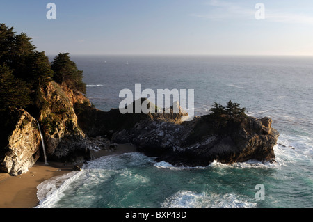 McWay waterfall falls falling into ocean Julia Pfeiffer Burns state park Pacific Highway One 1 California Big Sur coastline Stock Photo