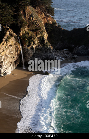 McWay waterfall falls falling into ocean Julia Pfeiffer Burns state park Pacific Highway One 1 California Big Sur coastline Stock Photo