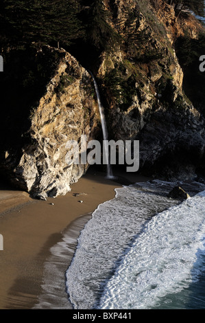 McWay waterfall falls falling into ocean Julia Pfeiffer Burns state park Pacific Highway One 1 California Big Sur coastline Stock Photo