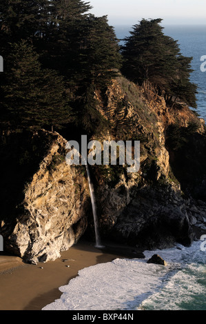 McWay waterfall falls falling into ocean Julia Pfeiffer Burns state park Pacific Highway One 1 California Big Sur coastline Stock Photo