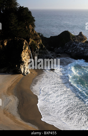 McWay waterfall falls falling into ocean Julia Pfeiffer Burns state park Pacific Highway One 1 California Big Sur coastline Stock Photo