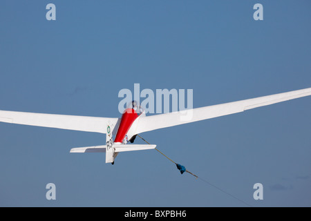 ASK13 Glider of the Crusaders Gliding Club, Cyprus taking off from Kingsfield airstrip, Dhekelia, with the help of a winch launch Stock Photo