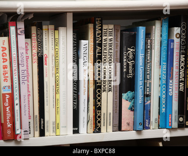 cookbooks on shelf Stock Photo