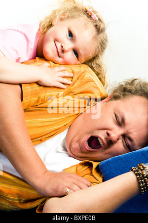 Photo of tired man wanting to sleep and the girl lying on his shoulder Stock Photo