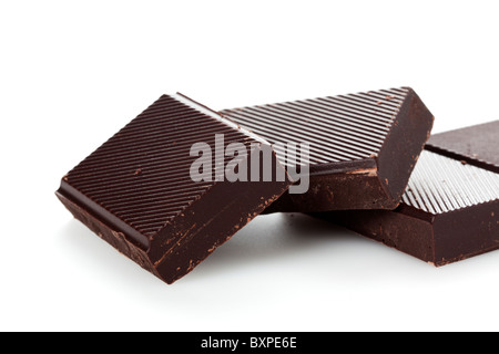 couverture chocolate blocks closeup on white background Stock Photo