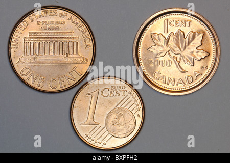 Small change, one cent coins from three countries Stock Photo