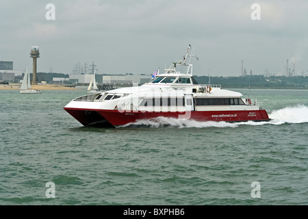 Red Funnel fast passenger catamaran ferry Red Jet 3 in the Solent off Southampton England Stock Photo