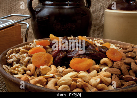 ray food gourmet sweet snack nuts nut healthy brown walnut edible delicious vegan vegetarian health nature rustik dates date Stock Photo