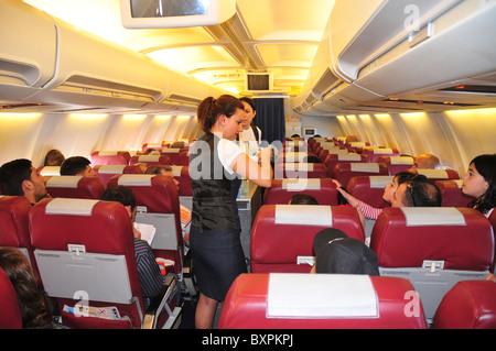 Cabin crew and passengers aboard a Sky Airlines flight to Antalya Turkey out of Tel Aviv Stock Photo