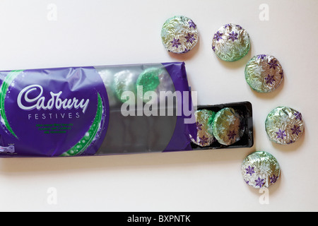 Cadbury Festives mint cream filled biscuits coated with Cadbury milk chocolate set on white background Stock Photo