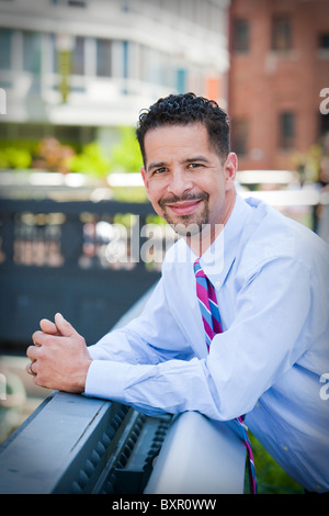 Portrait of young Hispanic businessman. Stock Photo