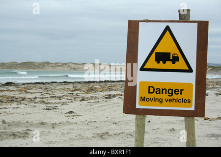 Danger, Moving vehicles sign on beach, Ireland Stock Photo