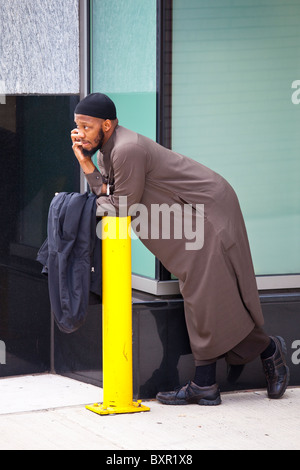 Muslim American man talking on a mobile phone in Washington DC Stock Photo