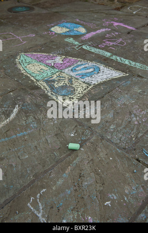 A childs chalk drawing on the pavement Stock Photo