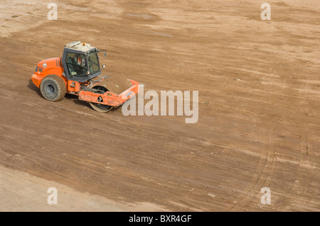 Vibratory soil compactor. HAMM 3000 series in action. Stock Photo